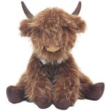 a charming plush highland cow door stop