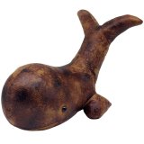 Charming faux leather whale doorstop loved by nature lovers