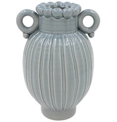 Elegant blue vase with clear glass finish and decorative beaded rim detail.