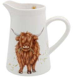 Add rustic charm to your home with this charming Highland Cow Jug