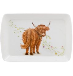 a charming Scottish highland cow serving tray 
