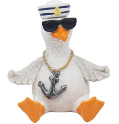 Bring seaside vibes to your decor with the Sailor Relaxing Seagull Figurine.