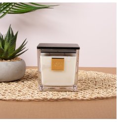 Elevate your space with the rich, luxurious aroma of the 450g Pomegranate Noir Candle.