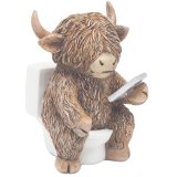 Bring humor home with this quirky Highland Cow on a toilet