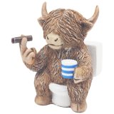 Add a moo-ving touch to your bathroom with this cheeky highland cow on the toilet 