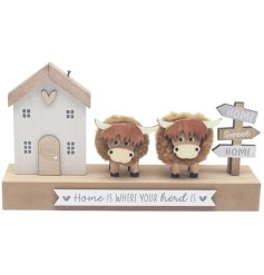 Bring cozy, rustic charm to your space with the "Home Is Where The Herd Is" Highland Cows Plaque.