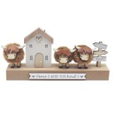 Add rustic charm with this Highland Cows Plaque