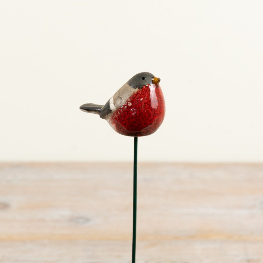 Bring a touch of woodland wonder to your garden with this charming red robin stake