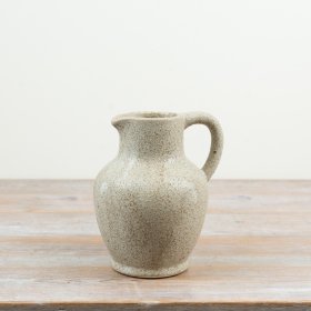 Elegant jug vase in a soft neutral shade featuring a distinctive design