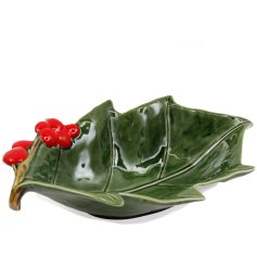 Bring festive cheer to your space with this decorative holly leaf bowl.