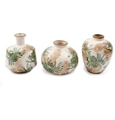Bring rustic charm to your decor with this elegant Pinecone Vase.