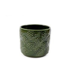 Bring natural beauty to your space with this elegant and stylish planter.