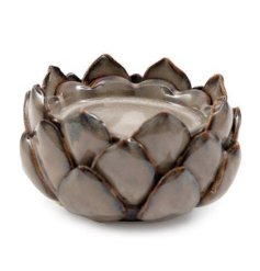 Bring natural charm to your space with this 12.5x7.5cm Earthy Candle Holder.