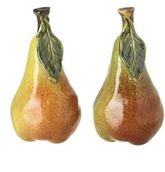 A beautifully crafted ceramic pear ornament featuring a rich, speckled glaze in warm autumnal tones.