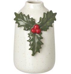 Enhance seasonal decor with this elegant ceramic holly vase for a chic festive accent.