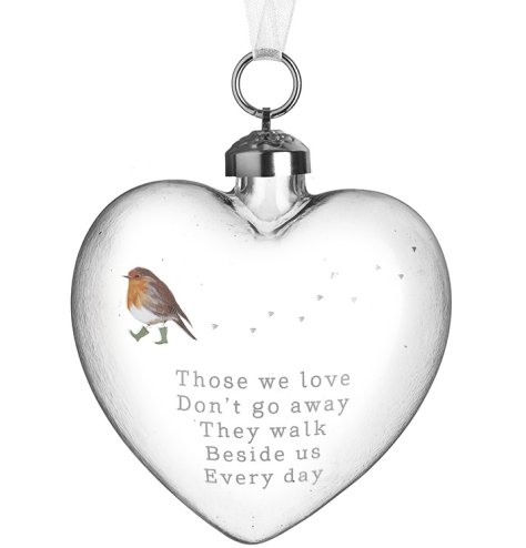 Add a heartfelt touch to seasonal decor with this elegant glass heart ornament.