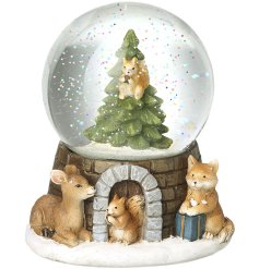 Add woodland charm to any space with this magical Green Woodland Animals Snowglobe.
