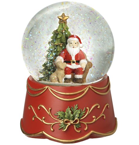 Add holiday joy with this delightful Santa and Dog snowglobe for your festive decor.