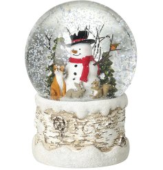 Capture winter's charm with this enchanting snowglobe.
