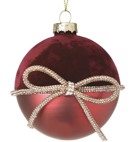 Add festive cheer to your holiday decor with this lovely red Christmas bauble.