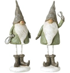 Delightful green gonks showcasing boots and festive bell-adorned hats for a cosy seasonal touch