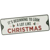 Add festive charm to your home with the "It's Beginning" Metal Sign