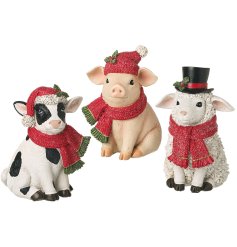 Add festive warmth with these adorable sitting farm animal decorations for your Christmas display