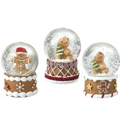 Bring festive joy to your home with a charming trio of gingerbread snowglobes full of seasonal spirit