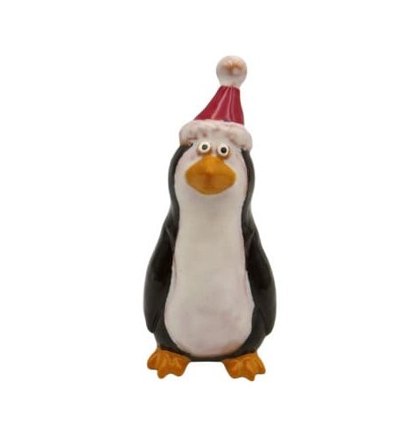 Adorable small penguin statue adding cheerful character to any room