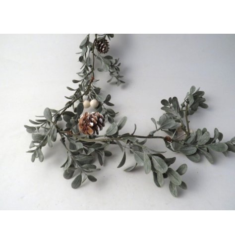 Charming garland decorated with frosted berries and pinecones to enhance your festive décor