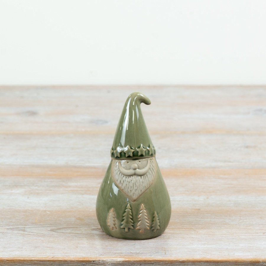 Add a touch of festive charm with this ceramic Christmas gonk figure in a soft green glaze