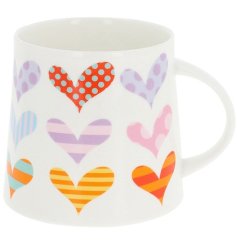Enjoy tea in style with the charming Hearts Mug for a perfect, elegant break.