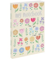 Dainty and elegant, the Ditsy Flowers A6 Notebook with cold foiling is perfect for capturing your thoughts 