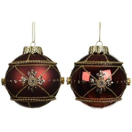 Elegant red and gold wire ornament for a festive touch.