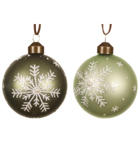 Add serene, nature-inspired charm to decor with this elegant set of frosted green glass baubles.