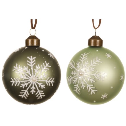 Add serene, nature-inspired charm to your decor with this elegant set of frosted green glass baubles.