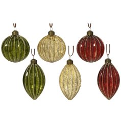 Decorate your Christmas tree with elegant gold glass baubles for a festive and sparkling holiday look.