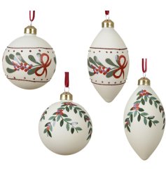 Add a stylish, natural charm to your Christmas with this elegant set of botanical glass baubles.