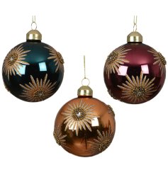 Bring festive cheer with these beautiful floral-themed baubles.