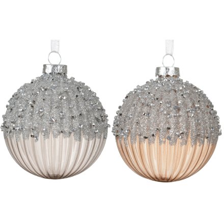 Enhance your holiday decor with beautiful gold and silver glass baubles for a festive touch.