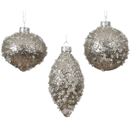 A delightful collection of silver Christmas ornaments.