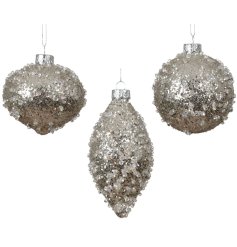 A delightful collection of silver Christmas ornaments.