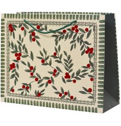 A delightful gift bag with a charming berry pattern.