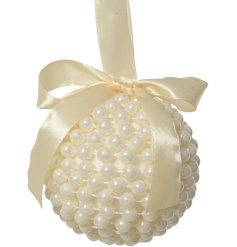 Elegant cream bow hanging ornament for festive decor.