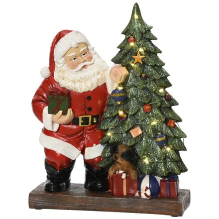 Add holiday joy inside with the Micro LED Santa Polyresin decoration.