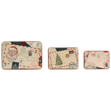 Add vintage charm to your seasonal decor with this coordinated set of three classic storage tins.