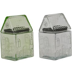 Organize your kitchen with our Glass House Storage Jars, offered in two clear, chic colors.