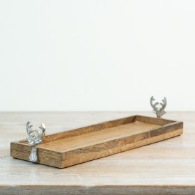 A rectangular wooden tray designed with decorative aluminium stag head handles