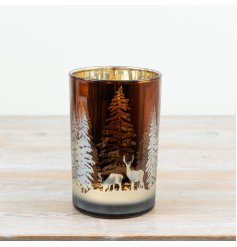Create a cosy winter charm with these shimmering metallic glass hurricane candle holders