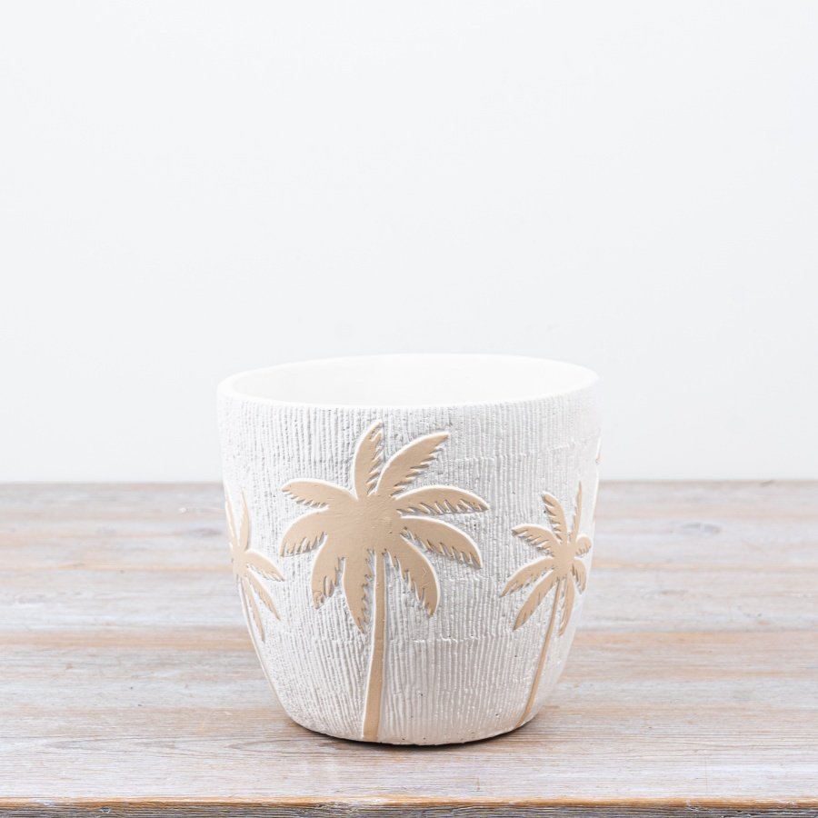 Bring tropical vibes to your space with this sturdy cement Palm Tree Planter.
